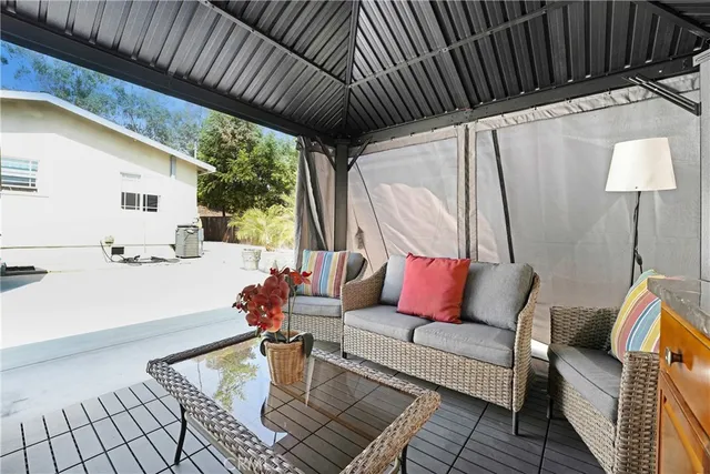 a outdoor living space with furniture