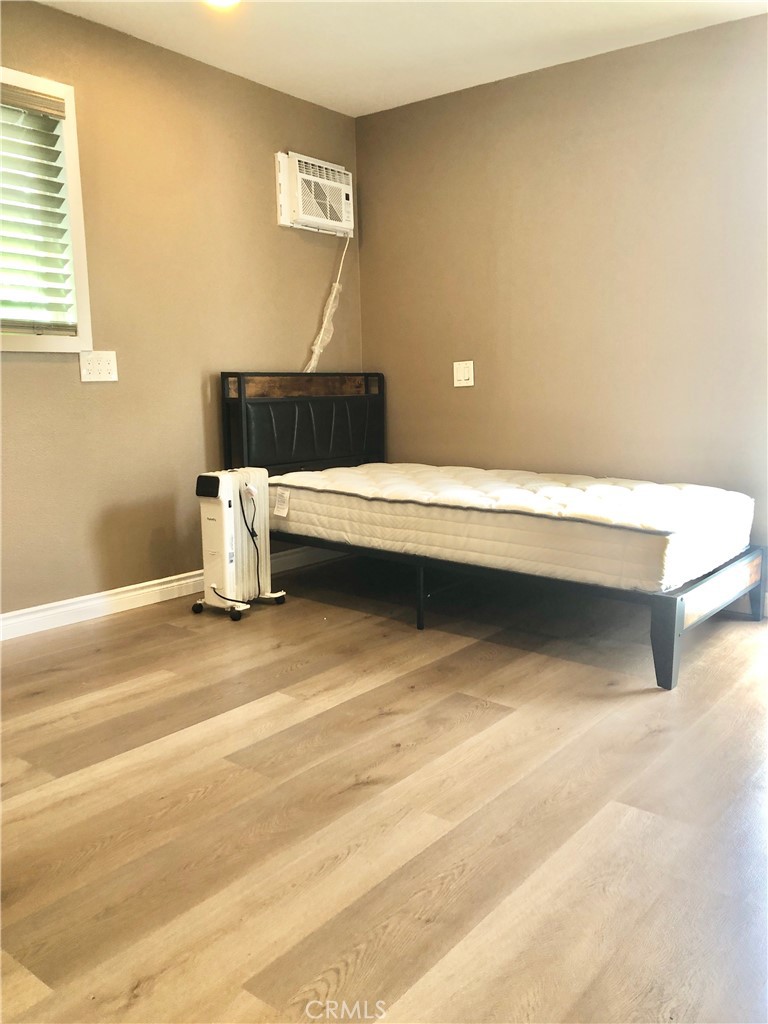 1982 Corson Street Pasadena, CA 91107 - Photo 18 of 30 a white bath tub sitting next to a white bench