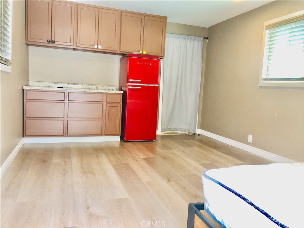 1982 Corson Street Pasadena, CA 91107 - Photo 19 of 30 a view of a kitchen with microwave and cabinets