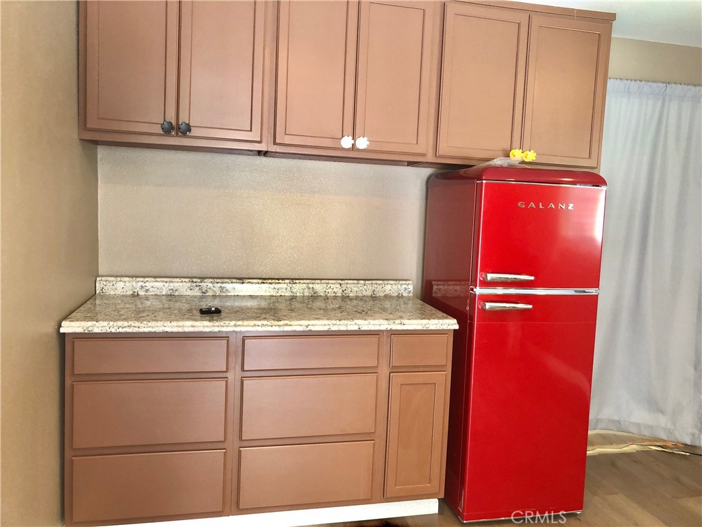 1982 Corson Street Pasadena, CA 91107 - Photo 20 of 30 a view of storage and utility room with washer and dryer