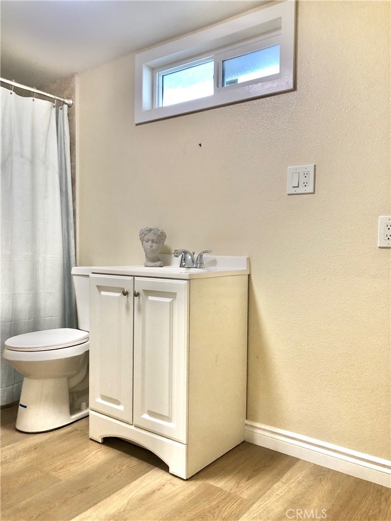 1982 Corson Street Pasadena, CA 91107 - Photo 24 of 30 a bathroom with a sink and a toilet