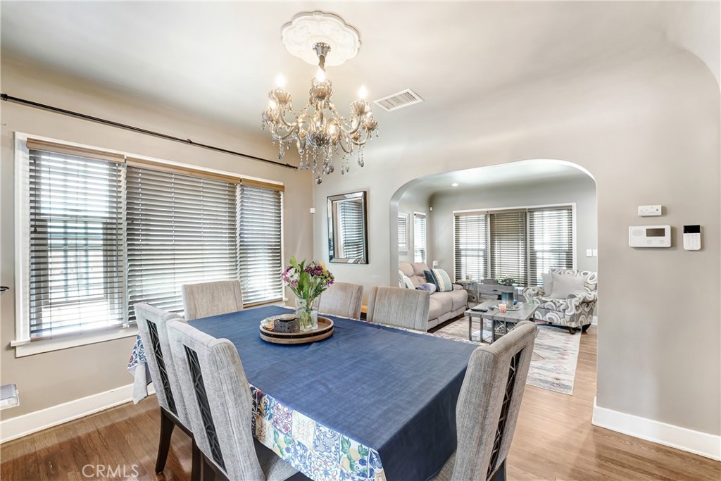 1982 Corson Street Pasadena, CA 91107 - Photo 7 of 30 a view of a dining room with furniture wooden floor and chandelier