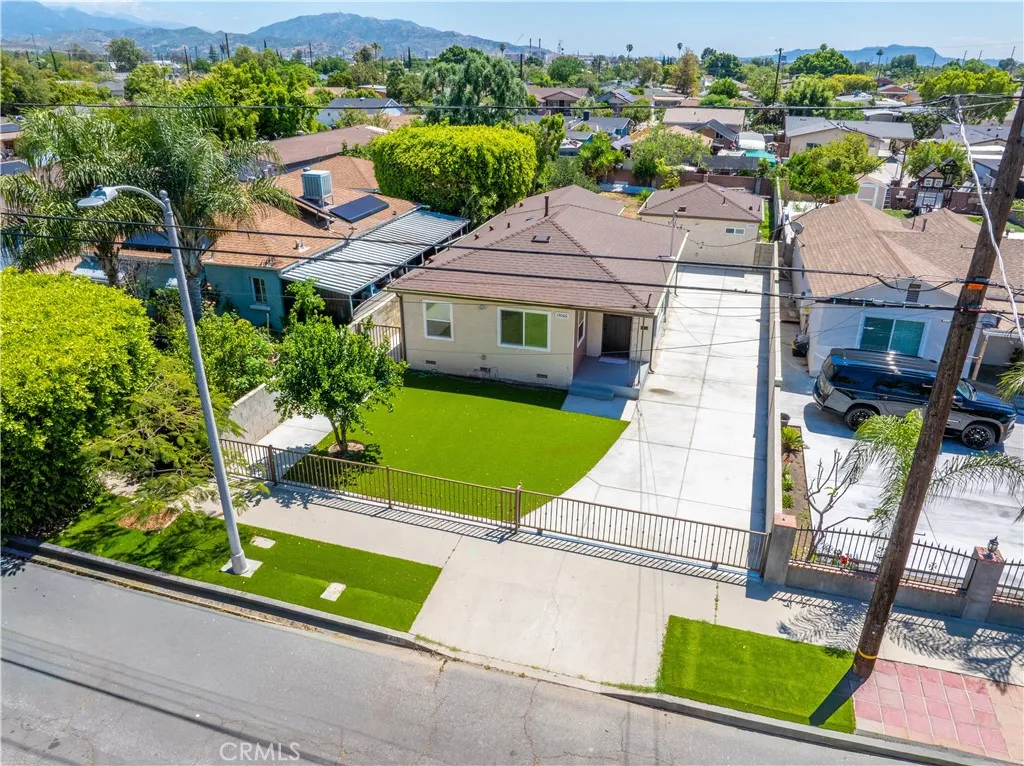 13066 Garber Street Pacoima, CA 91331 - Photo 67 of 68 an aerial view of a house with garden space and lake view