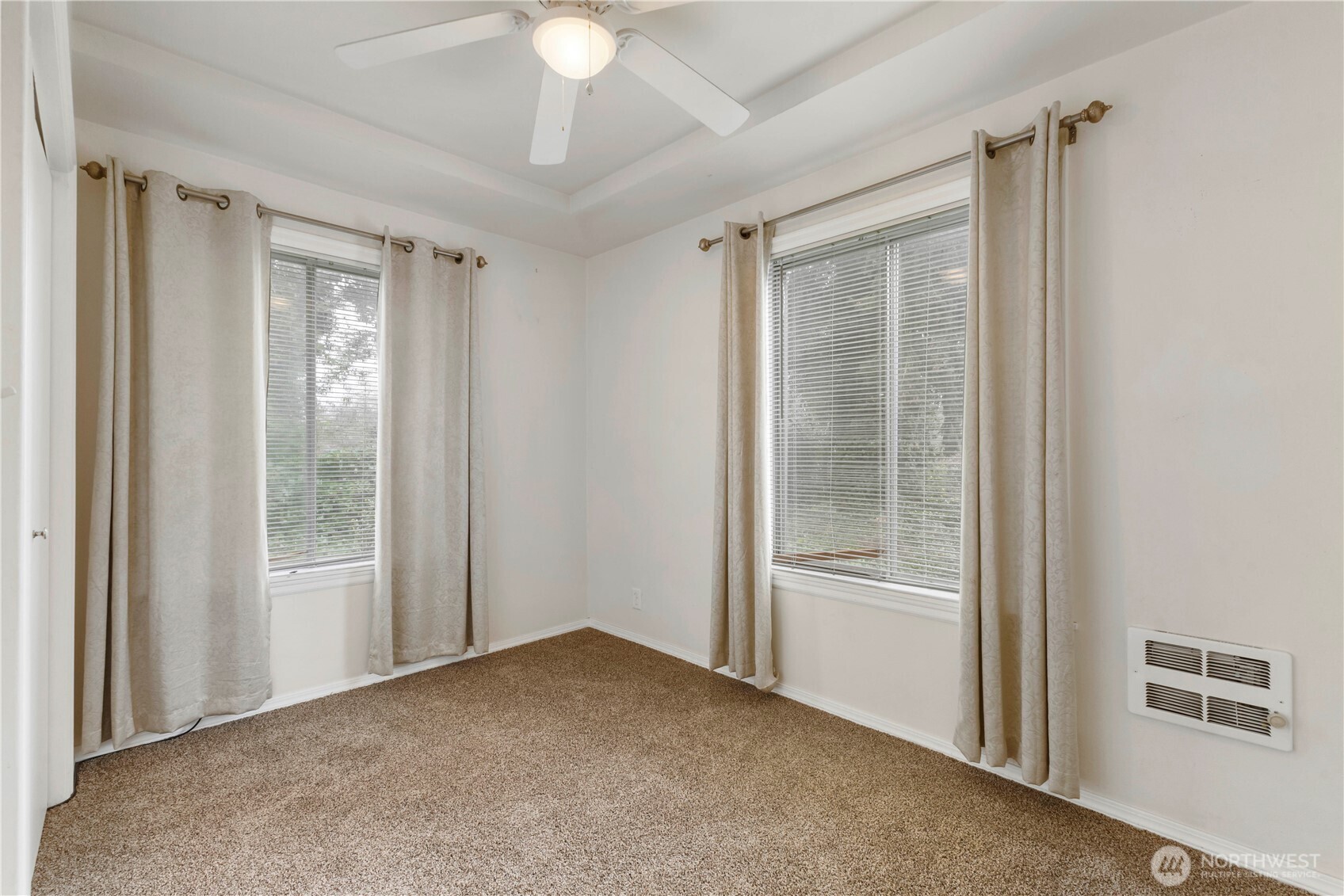 10114 Canyon Road East Tacoma, WA 98446 - Photo 14 of 31 a view of an empty room with a window