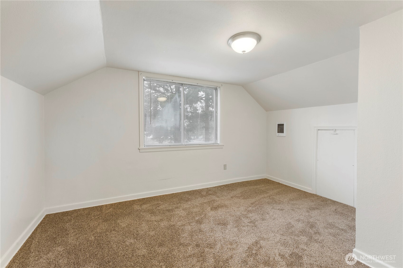 10114 Canyon Road East Tacoma, WA 98446 - Photo 21 of 31 an empty room with windows