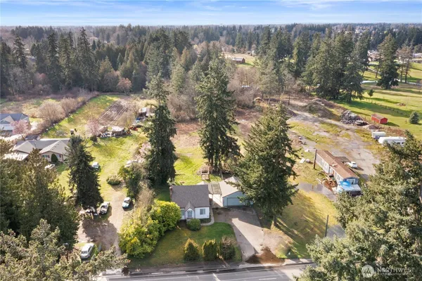 a backyard of a house with lots of green space