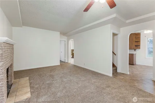 a kitchen with stainless steel appliances a stove a sink and a refrigerator