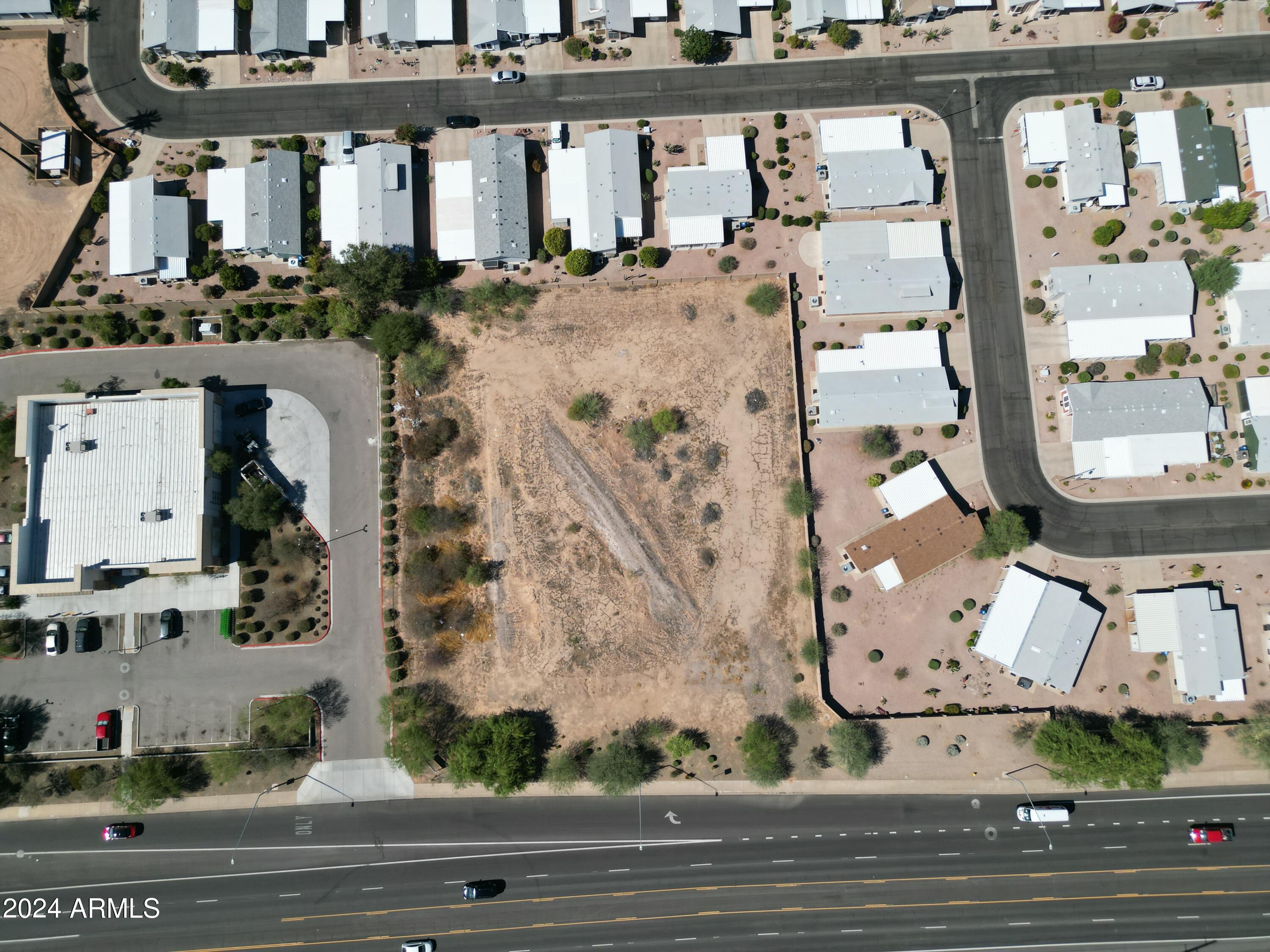 8442 East Southern Avenue, Unit 2 Mesa, AZ 85209 - Photo 1 of 15 an aerial view of a building with street