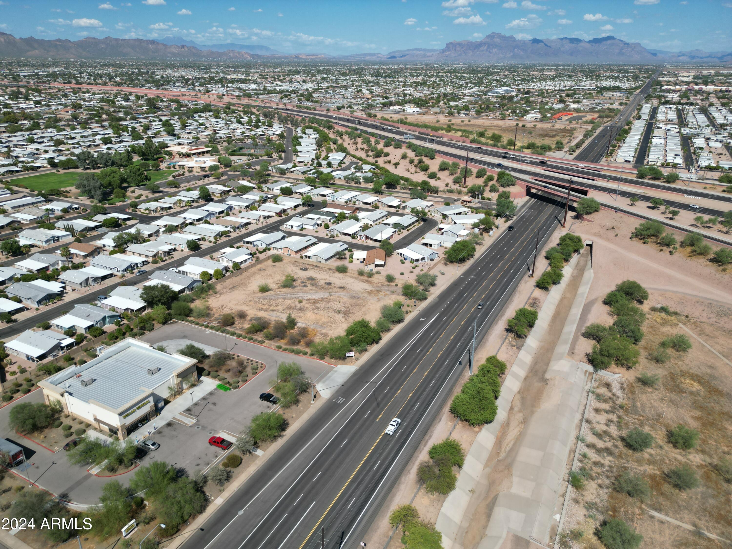 8442 East Southern Avenue, Unit 2 Mesa, AZ 85209 - Photo 10 of 15 an aerial view of residential houses with yard