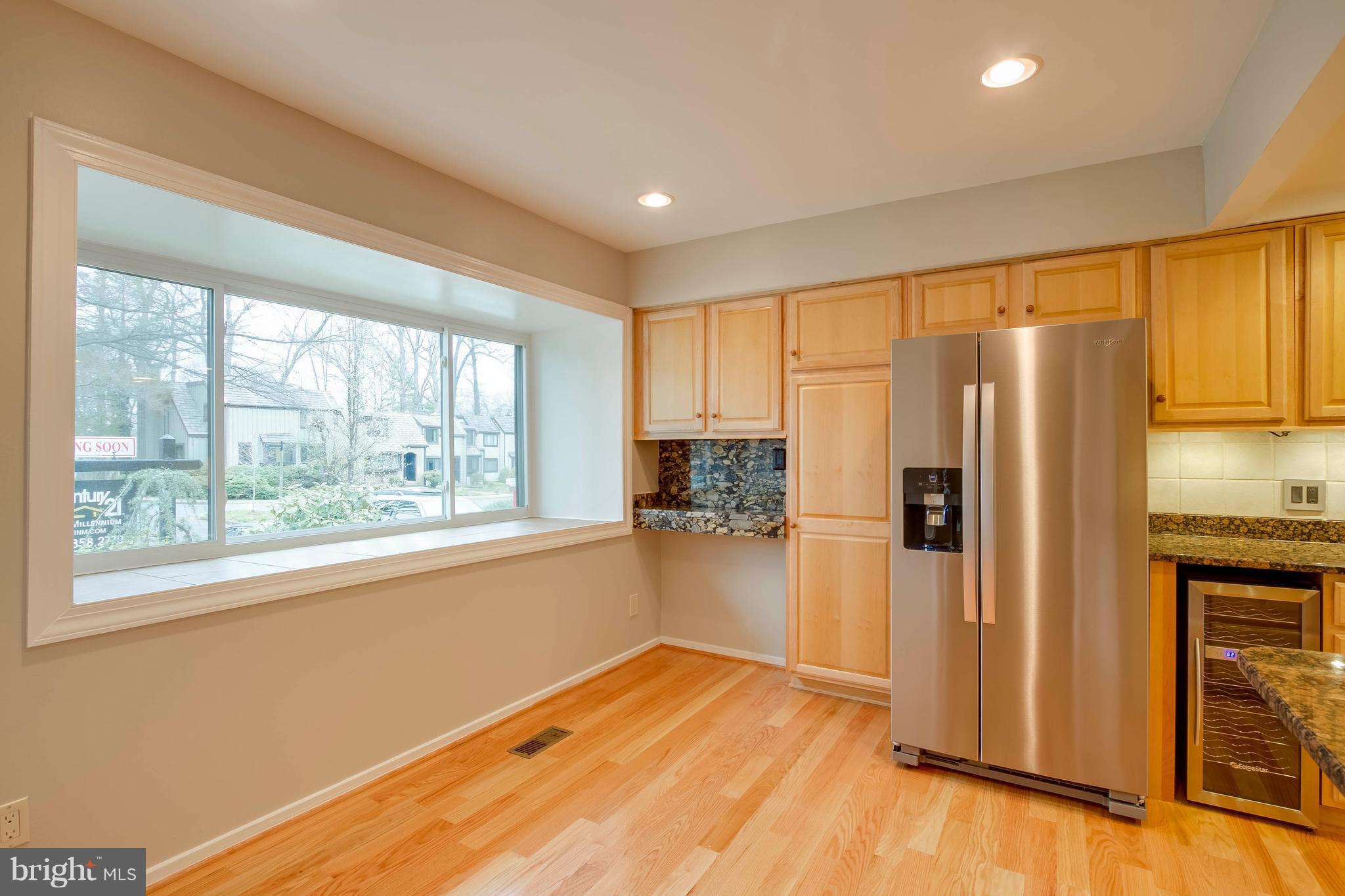 1513 Farsta Court Reston, VA 20190 - Photo 3 of 26 Kitchen with beautiful Bay Window and wine cooler