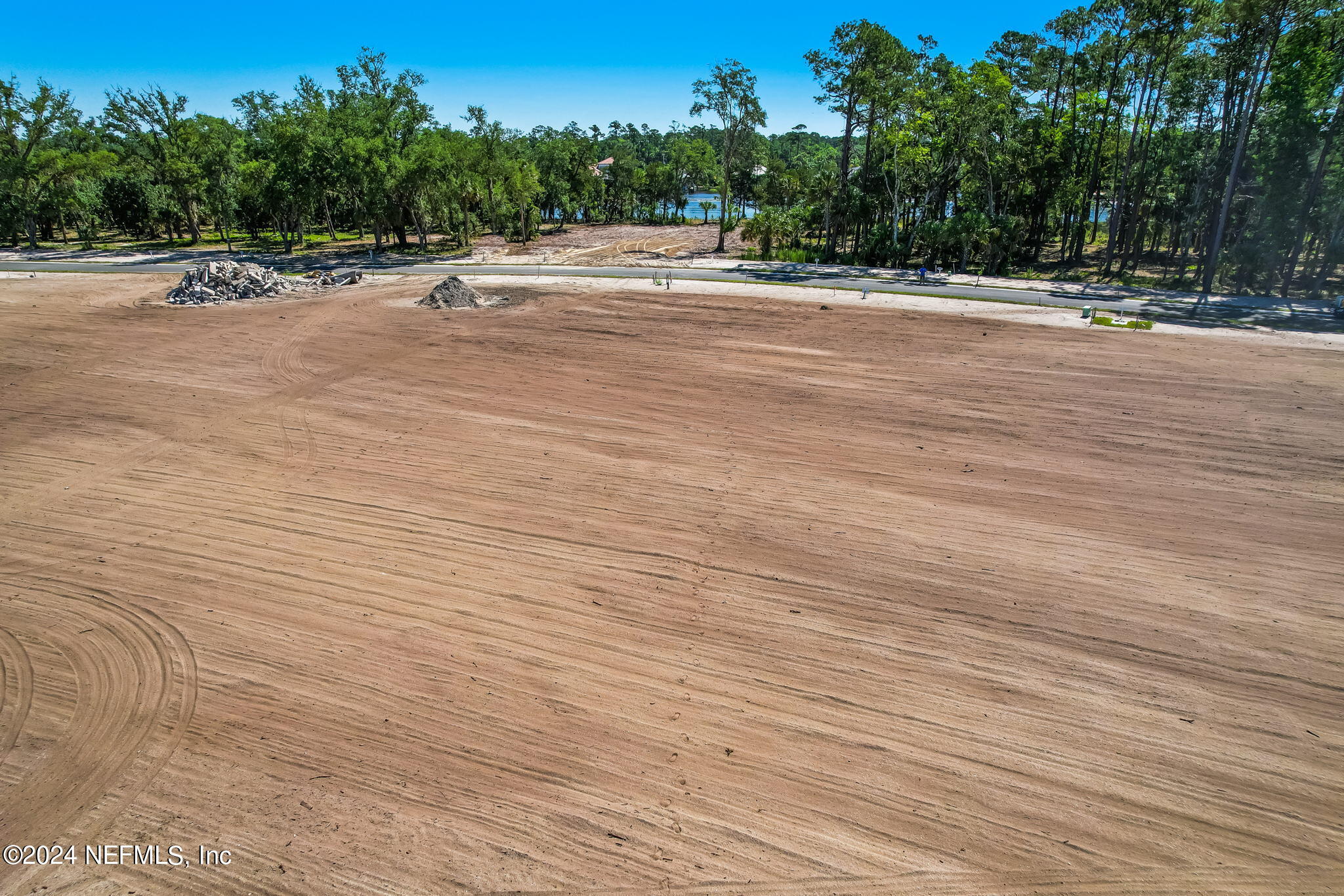 450 Shell Ridge Lane Ponte Vedra, FL 32081 - Photo 12 of 28 a view of a road with a trees