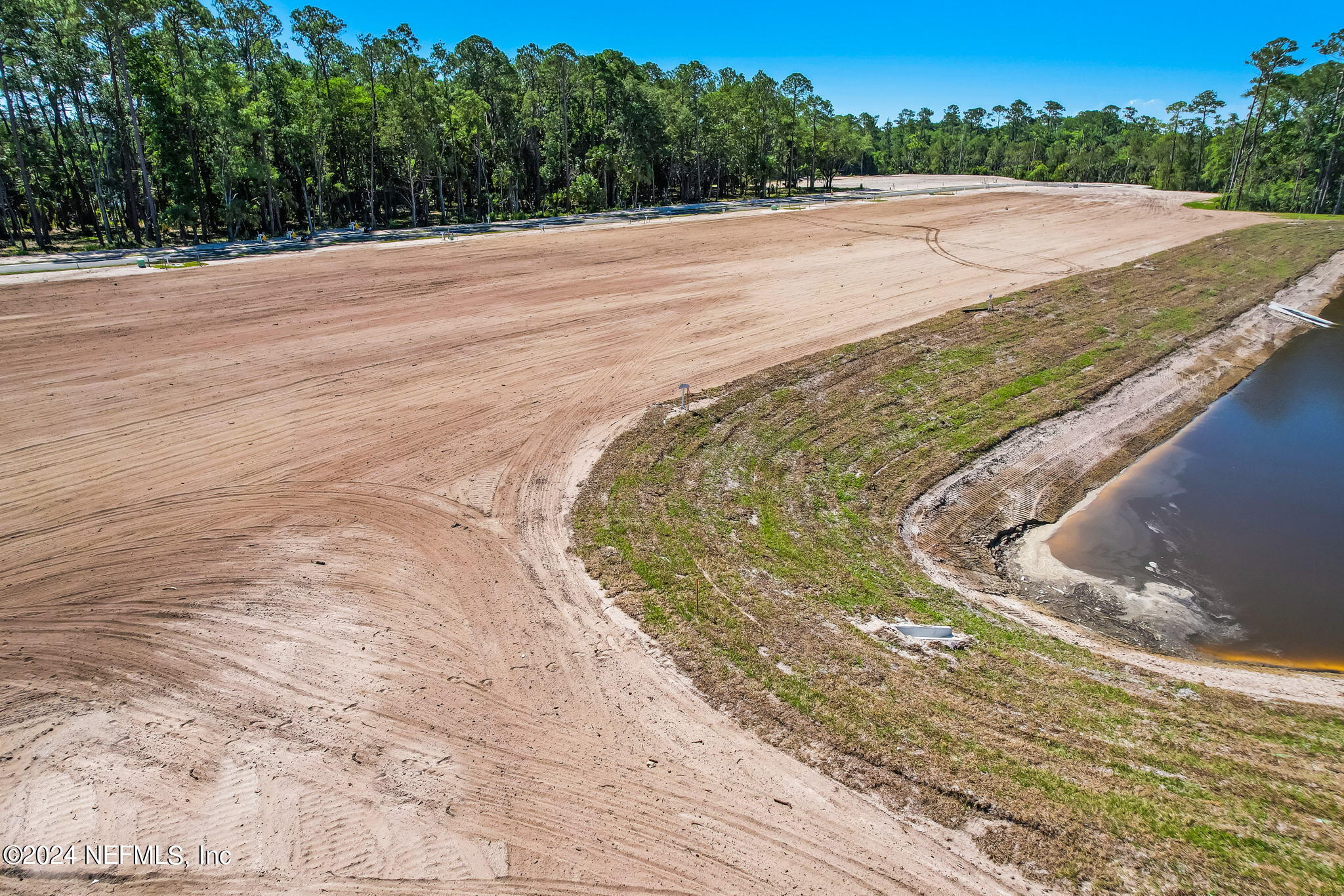 450 Shell Ridge Lane Ponte Vedra, FL 32081 - Photo 14 of 28 a view of a swimming pool with a yard