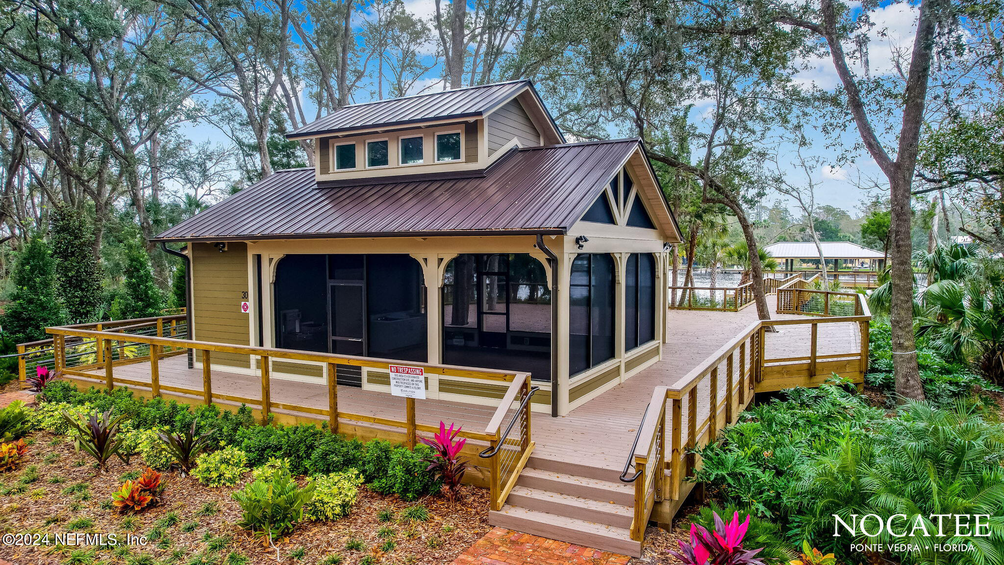 450 Shell Ridge Lane Ponte Vedra, FL 32081 - Photo 24 of 28 front view of a house with a porch