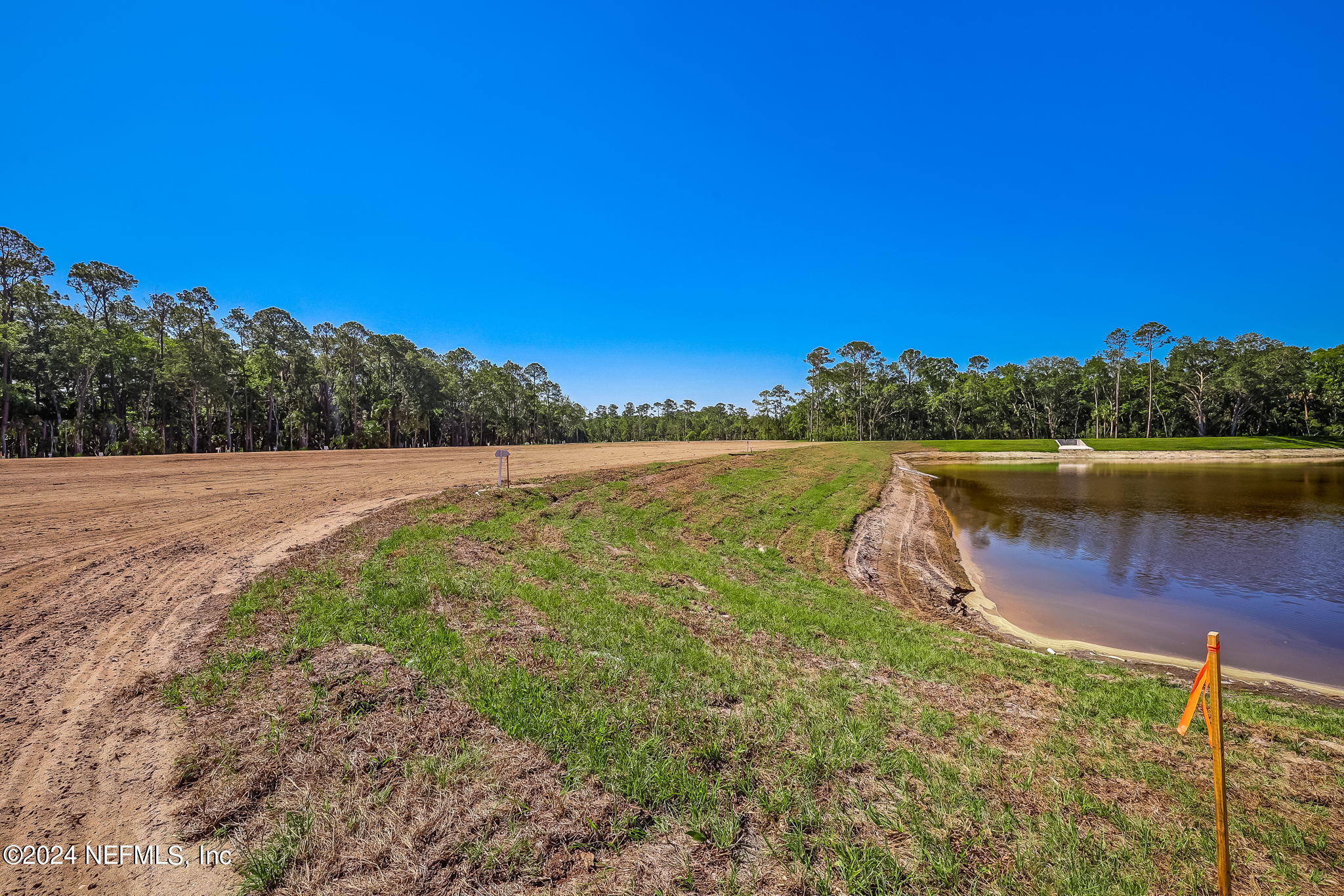 450 Shell Ridge Lane Ponte Vedra, FL 32081 - Photo 8 of 28 a view of a lake with a big yard