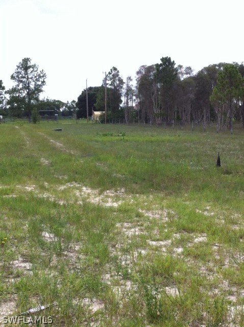 12091 Shawnee Road Fort Myers, FL 33913 - Photo 3 of 7 a view of a field with an ocean