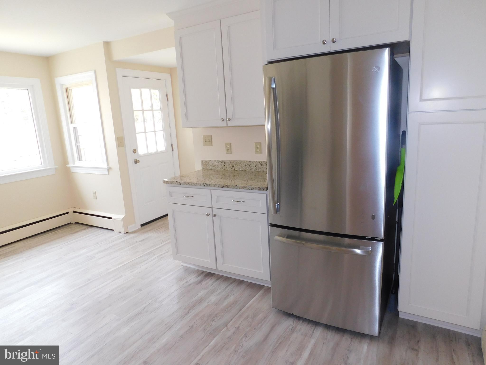 13069 Dahlgren Road King George, VA 22485 - Photo 11 of 32 Dining Room Into Kitchen