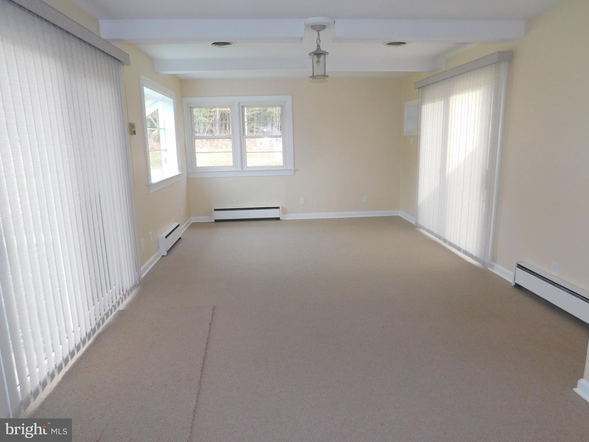 13069 Dahlgren Road King George, VA 22485 - Photo 12 of 32 Dining Room Into Sun Room