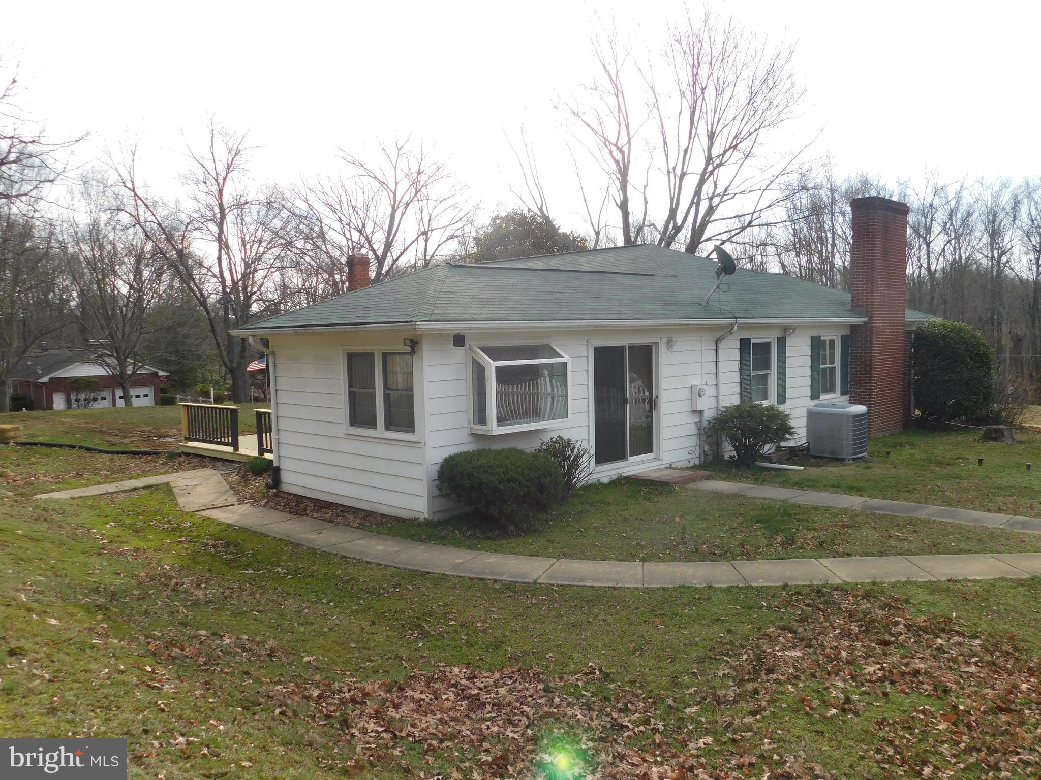 13069 Dahlgren Road King George, VA 22485 - Photo 7 of 32 Left Side of House and Rear
