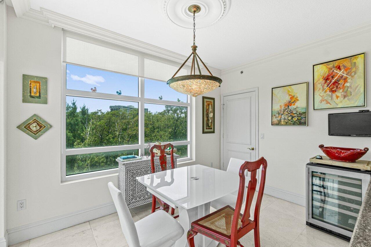 3740 South Ocean Boulevard, Unit 201 Highland Beach, FL 33487 - Photo 14 of 62 a dining room with furniture and window