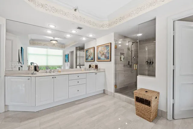 a view of a patio with couches chairs and wooden floor