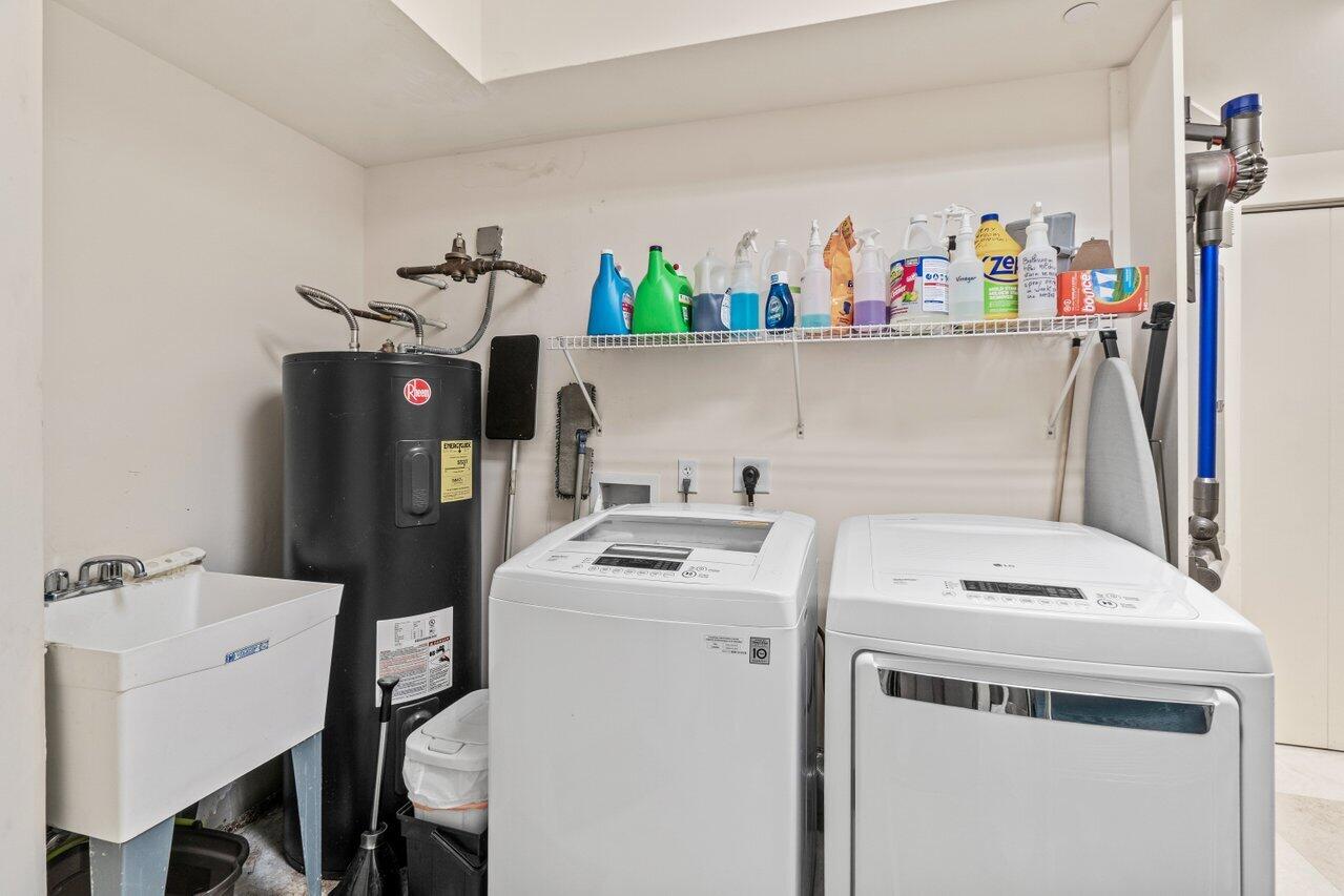 3740 South Ocean Boulevard, Unit 201 Highland Beach, FL 33487 - Photo 38 of 62 a utility room with dryer and washer