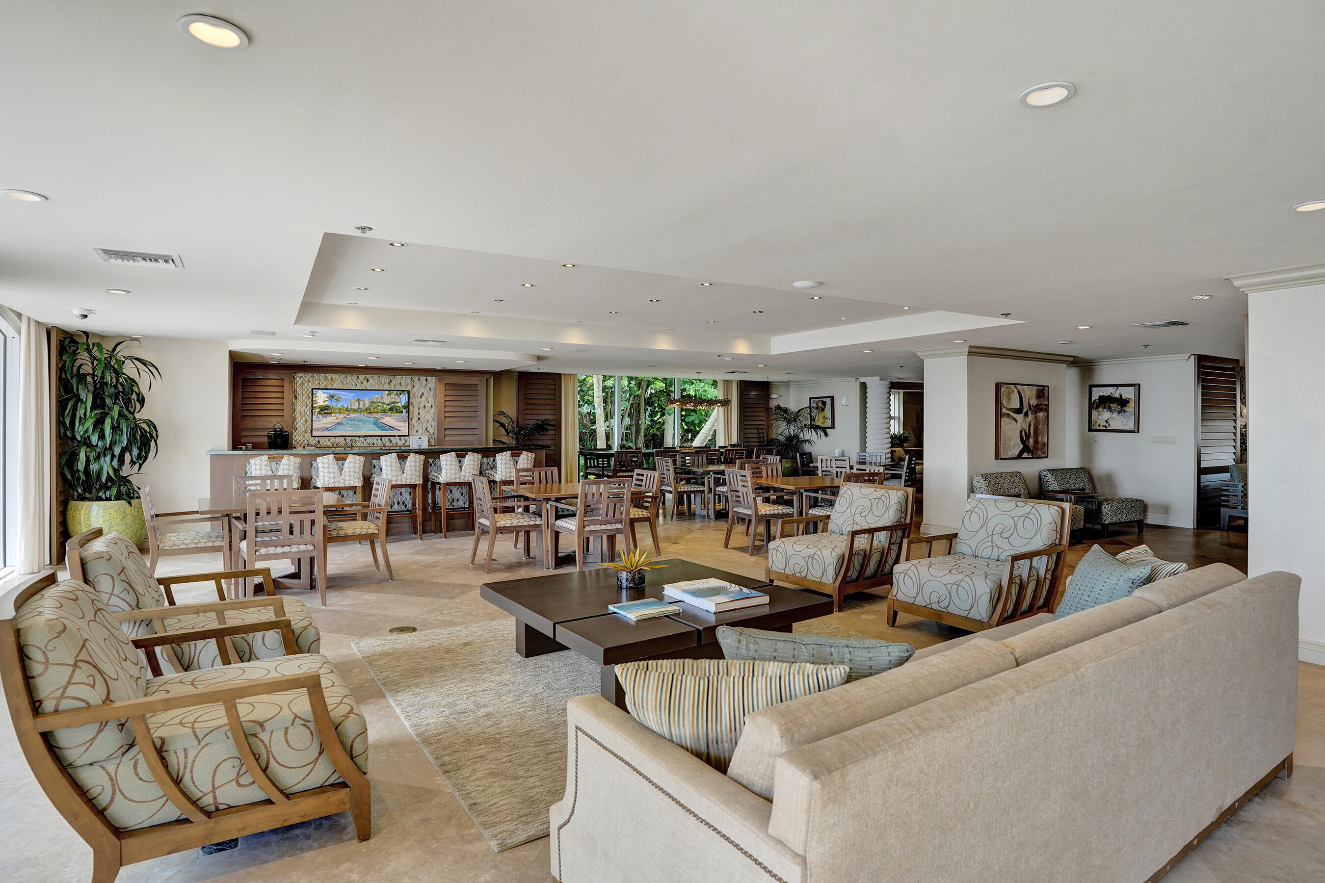 3740 South Ocean Boulevard, Unit 201 Highland Beach, FL 33487 - Photo 57 of 62 a living room with lots of furniture and view of kitchen
