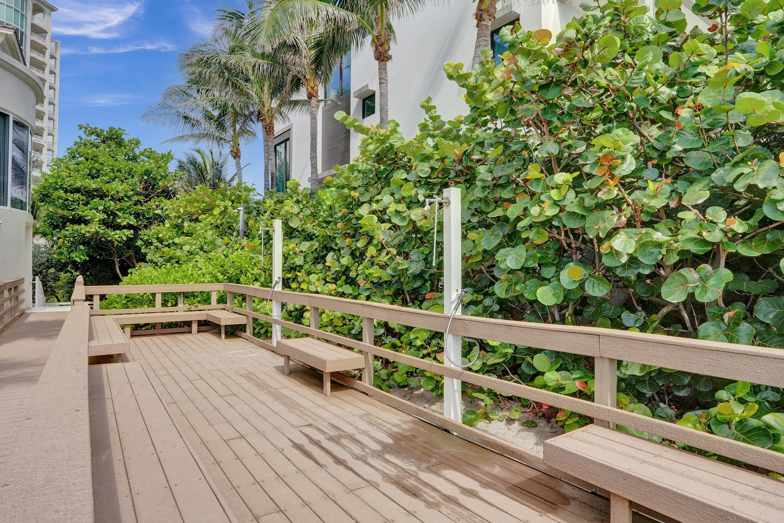 3740 South Ocean Boulevard, Unit 201 Highland Beach, FL 33487 - Photo 61 of 62 a view of a balcony with chairs and wooden floor