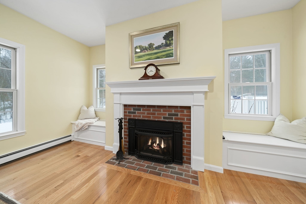 86 Telegraph Hill Road Marshfield, MA 02050 - Photo 13 of 42 a living room with furniture and a fireplace