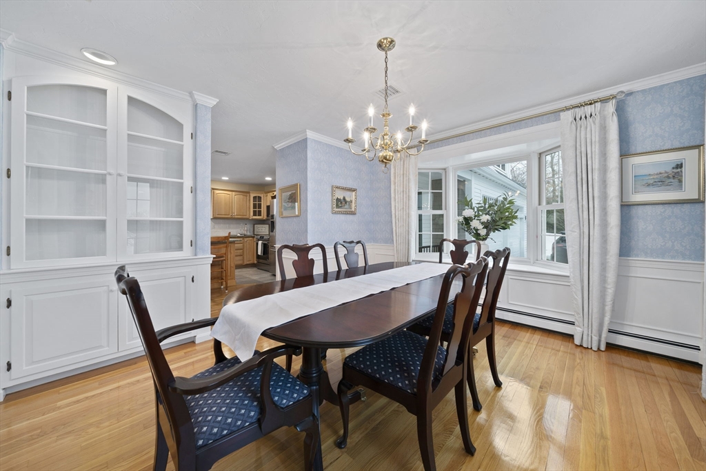 86 Telegraph Hill Road Marshfield, MA 02050 - Photo 14 of 42 a view of a dining room with furniture window and wooden floor