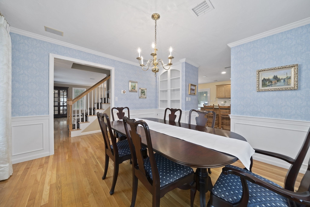 86 Telegraph Hill Road Marshfield, MA 02050 - Photo 15 of 42 a view of a dining room with furniture and wooden floor