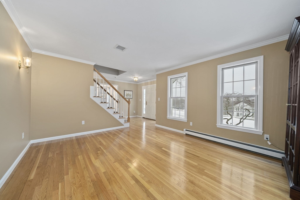 86 Telegraph Hill Road Marshfield, MA 02050 - Photo 16 of 42 a view of an empty room with window and wooden floor