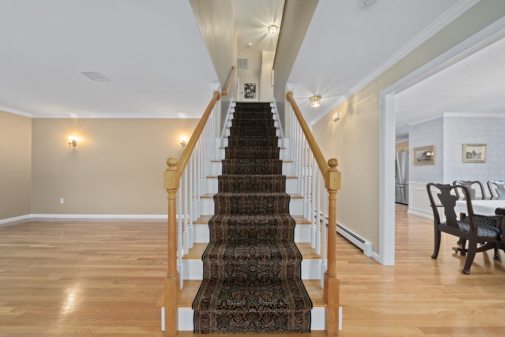 86 Telegraph Hill Road Marshfield, MA 02050 - Photo 17 of 42 a view of entryway and hall with wooden floor