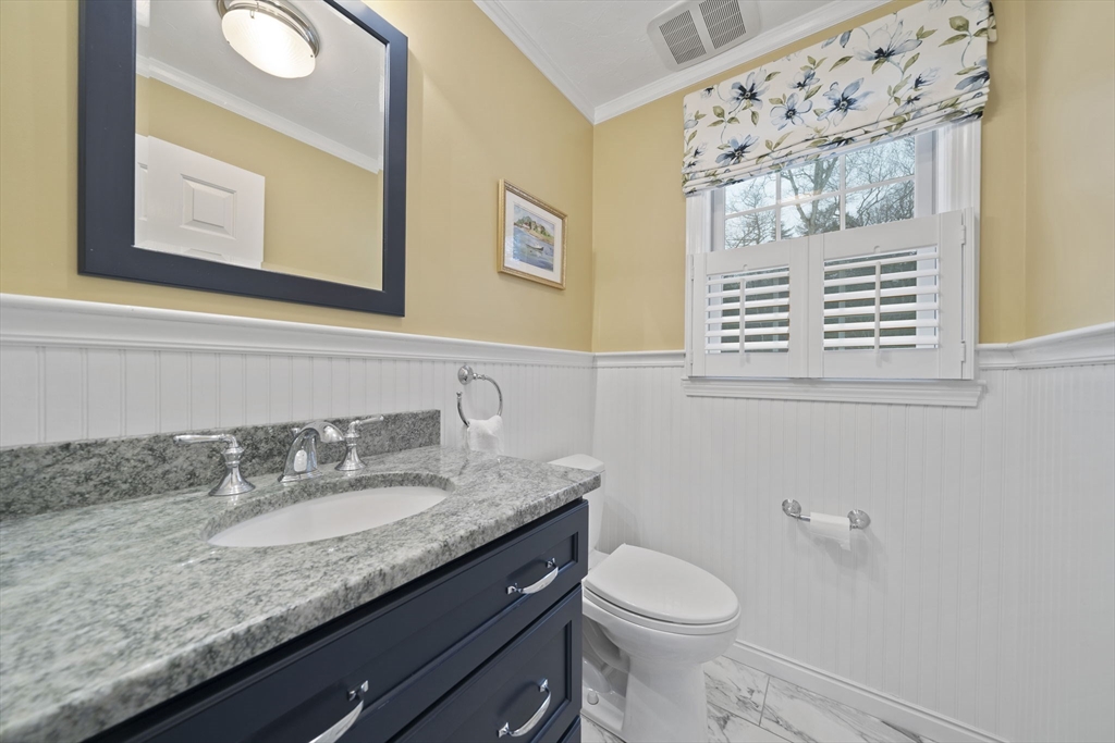 86 Telegraph Hill Road Marshfield, MA 02050 - Photo 19 of 42 a bathroom with a granite countertop sink toilet and mirror