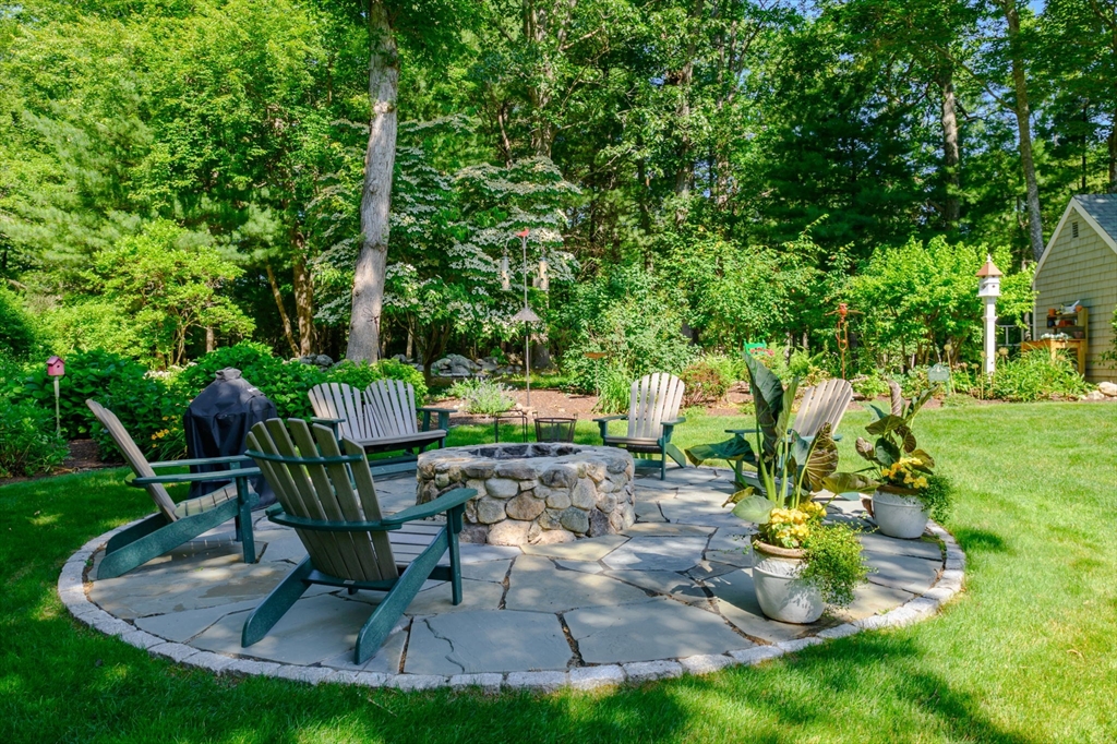 86 Telegraph Hill Road Marshfield, MA 02050 - Photo 31 of 42 a view of a chair and table in backyard of the house