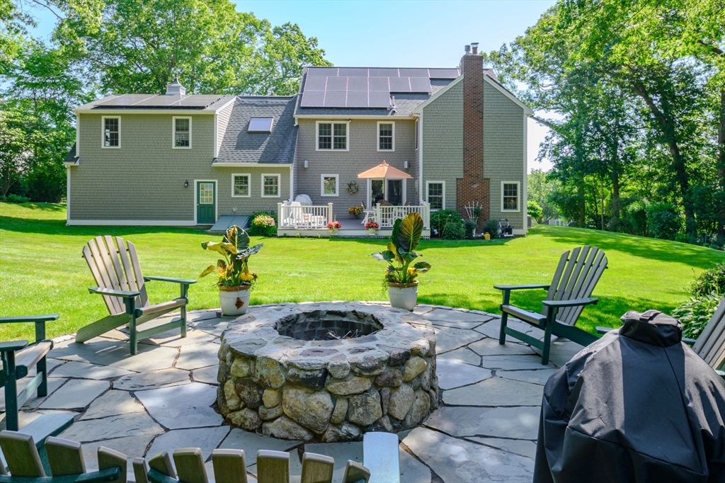86 Telegraph Hill Road Marshfield, MA 02050 - Photo 32 of 42 a view of a house with backyard and a patio