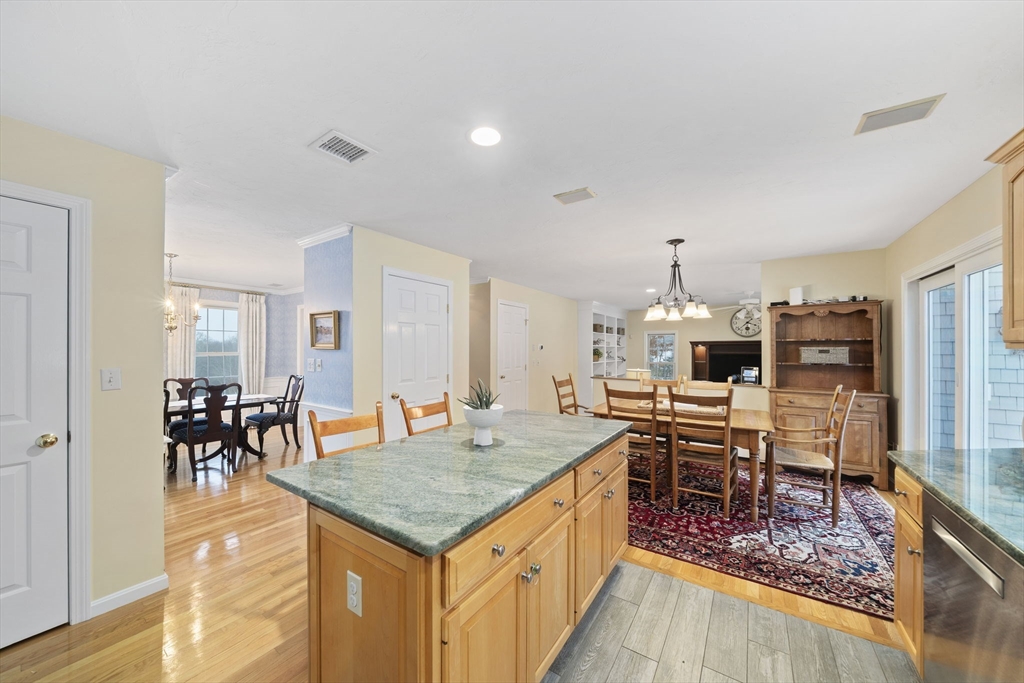 86 Telegraph Hill Road Marshfield, MA 02050 - Photo 8 of 42 a view of a dining room with furniture and wooden floor