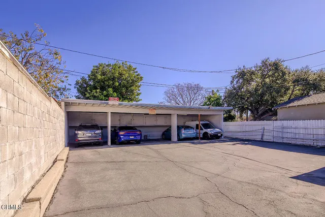 a view of a car garage and car parked