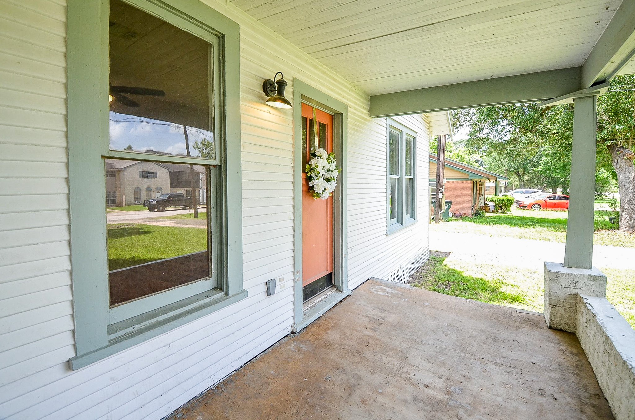 1615 Eagle Lake Road Sealy, TX 77474 - Photo 2 of 19 Imagine adding some rocking chairs, settling in and drinking a cool beverage as the day passes along! Life is much simpler on the front porch!