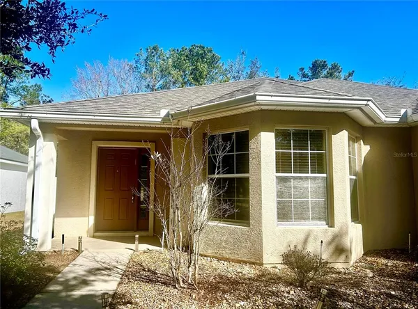 a view of a house with a small porch