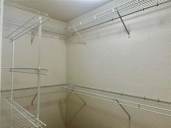 a view of a room with racks on the wall
