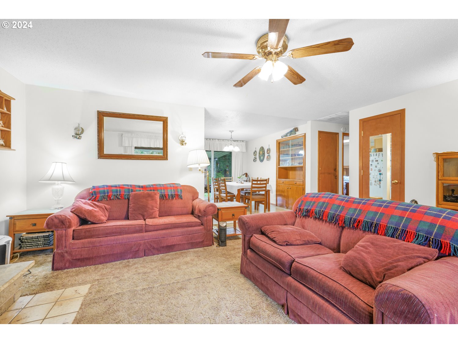 29015 Southeast Church Road Boring, OR 97009 - Photo 11 of 41 a living room with furniture ceiling fan and a rug