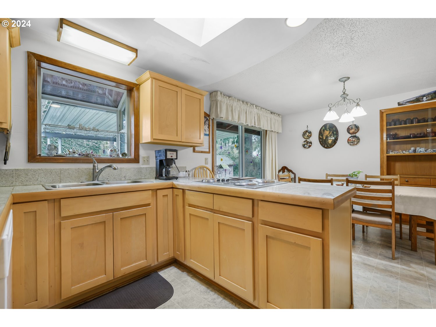 29015 Southeast Church Road Boring, OR 97009 - Photo 13 of 41 a kitchen with a sink cabinets and window