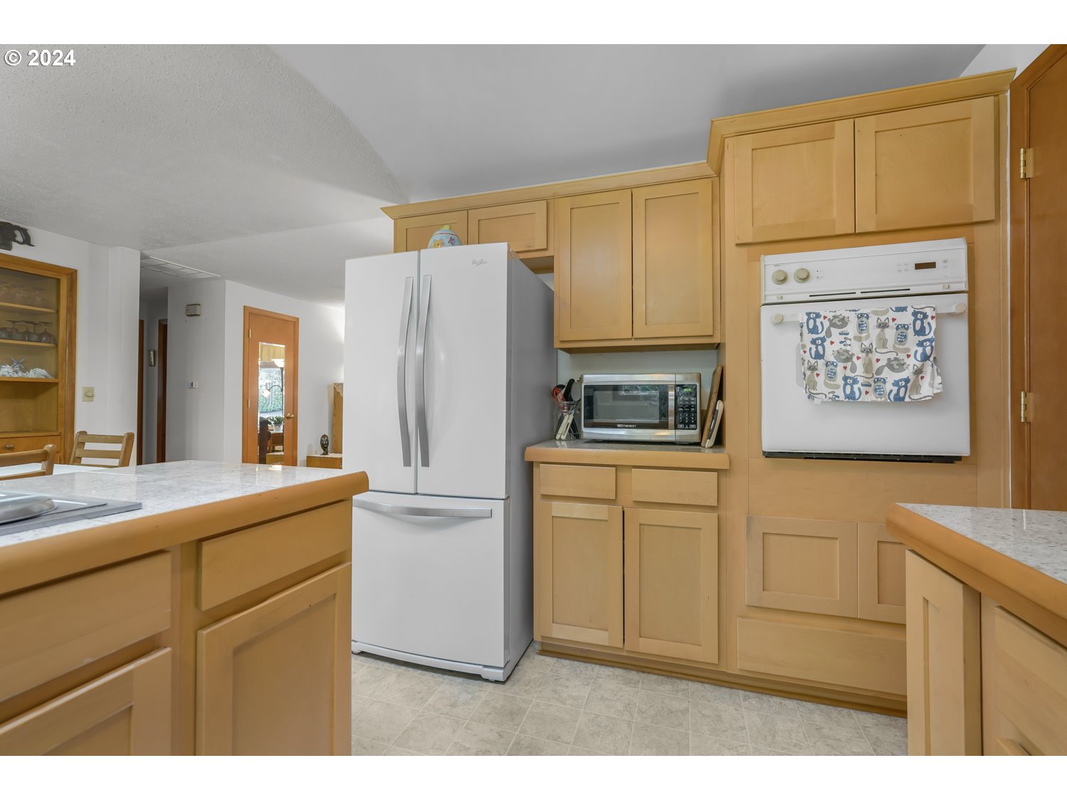 29015 Southeast Church Road Boring, OR 97009 - Photo 14 of 41 a kitchen with a refrigerator and cabinets