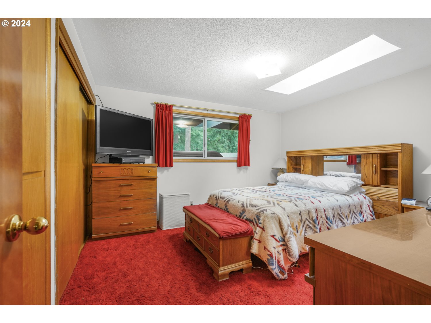 29015 Southeast Church Road Boring, OR 97009 - Photo 19 of 41 a bedroom with a bed and wooden floor