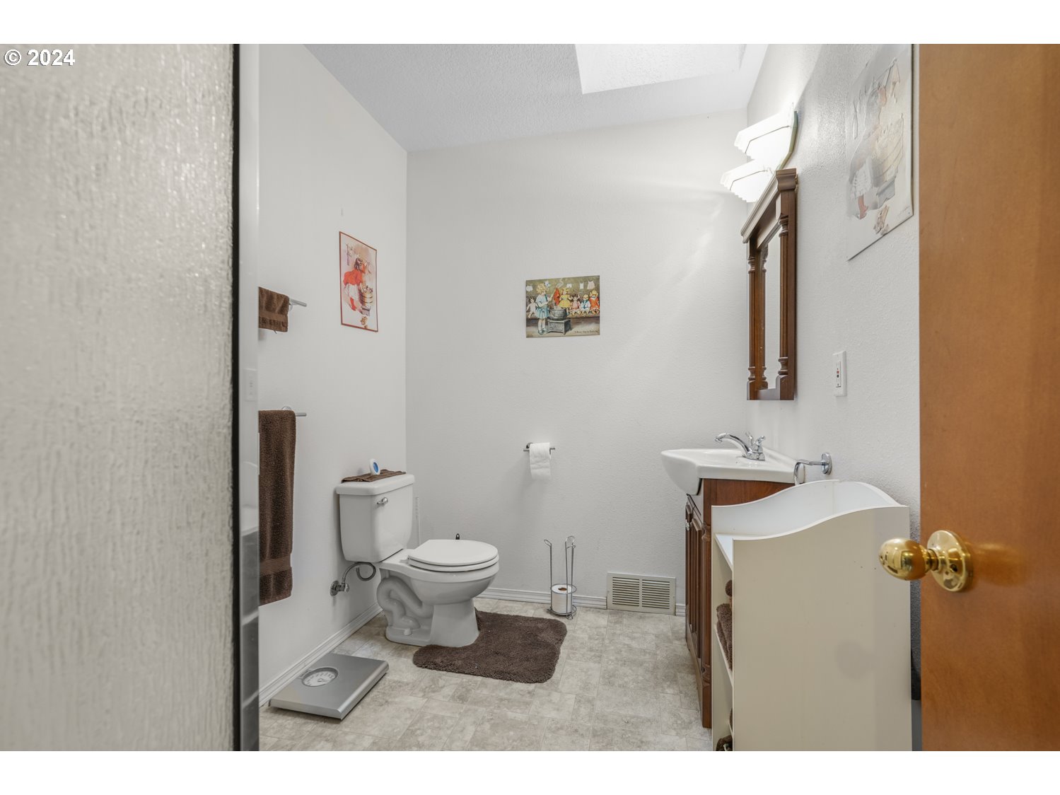 29015 Southeast Church Road Boring, OR 97009 - Photo 21 of 41 a bathroom with a sink toilet and mirror