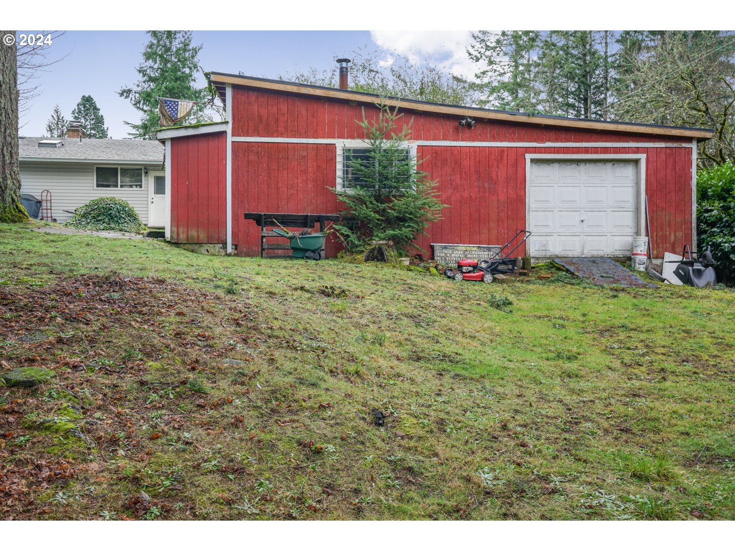 29015 Southeast Church Road Boring, OR 97009 - Photo 7 of 41 a view of backyard with potted plants and large tree