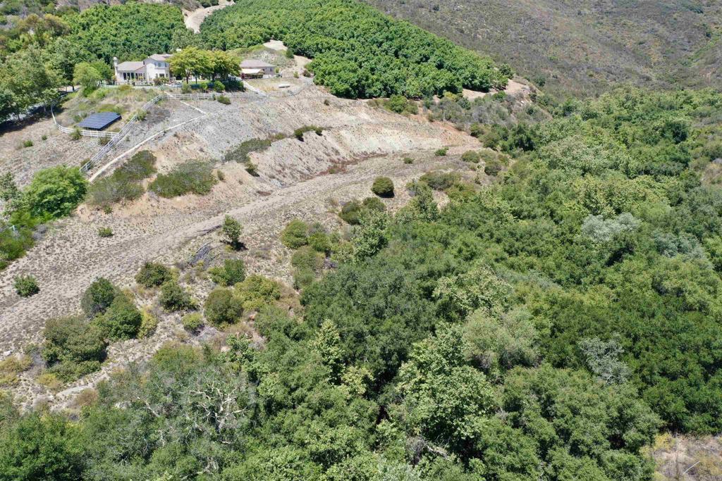 El Calamar Temecula, CA 92590 - Photo 7 of 10 an aerial view of a house with a yard and large trees
