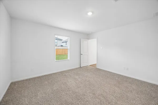 an empty room with window