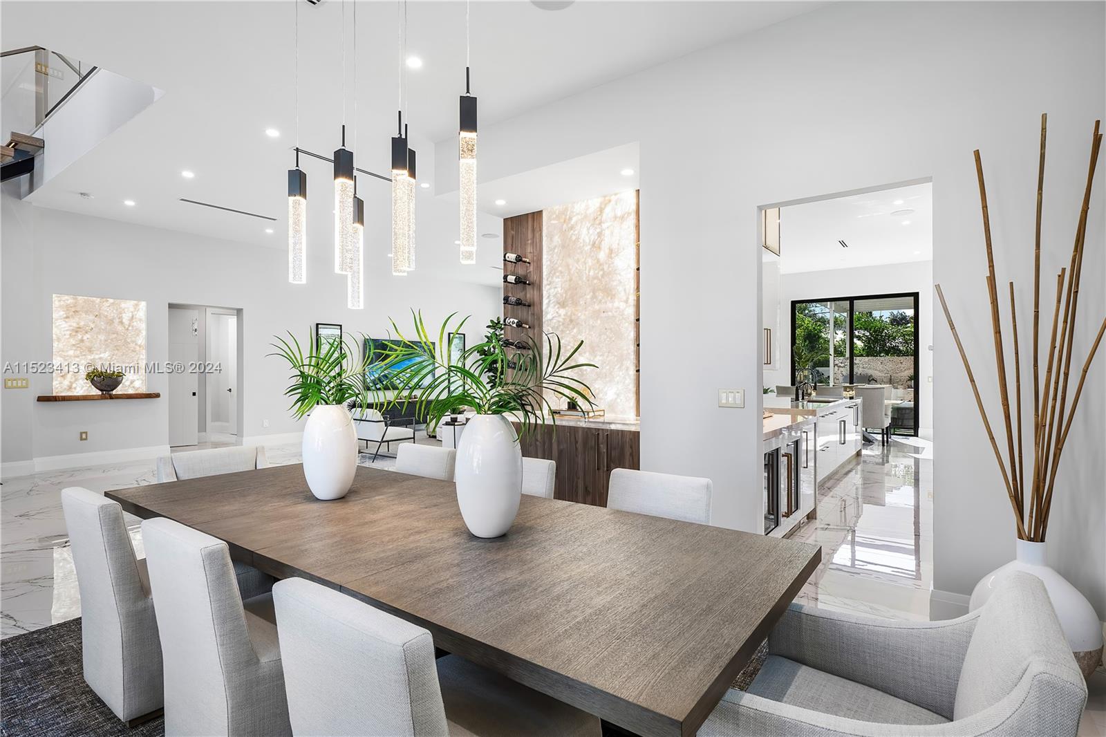 364 Northeast 6th Street Boca Raton, FL 33432 - Photo 12 of 80 a view of a dining room with furniture and a potted plant