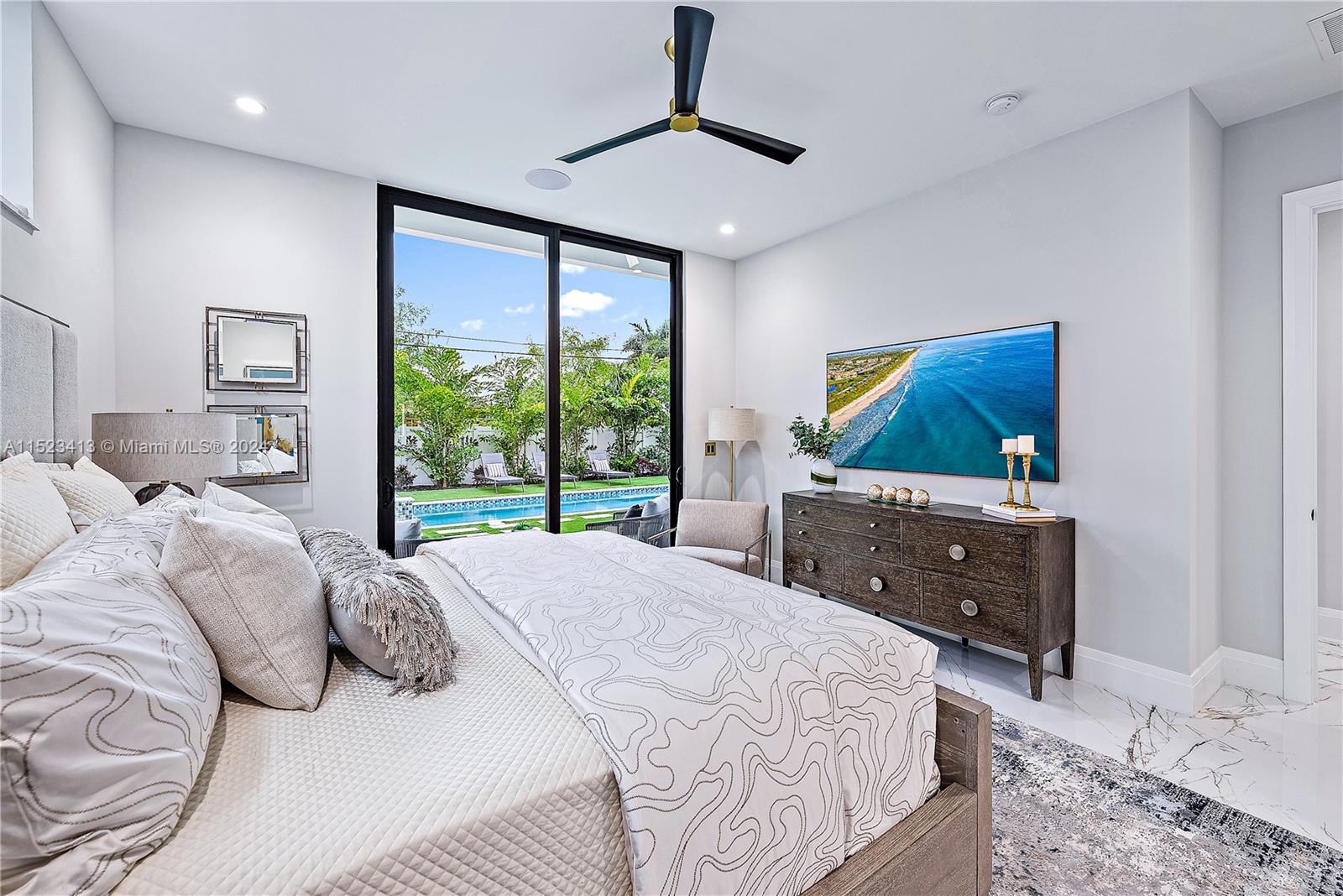 364 Northeast 6th Street Boca Raton, FL 33432 - Photo 26 of 80 a bedroom with a bed and a dresser